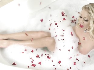 MILF Katie Morgan soaks herself in a bubble bath while waiting for Calvin