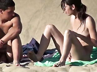 spanish couple have fun at beach